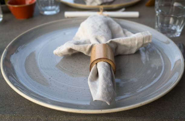 istock Napkin on a plate inside a bamboo holder 2172544534