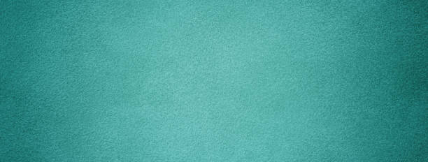 istock Cyan background from felt textile material with vignette. Structure turquoise suede velvet fabric with texture 2172545291