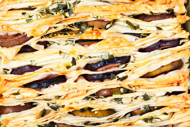 Homemade filo pastry pie with ripe figs and brie cheese. Close up