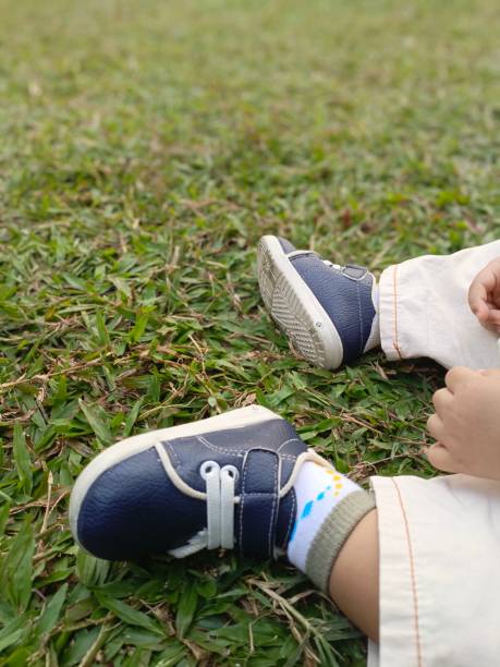 istock The baby is playing outdoor 2172554097
