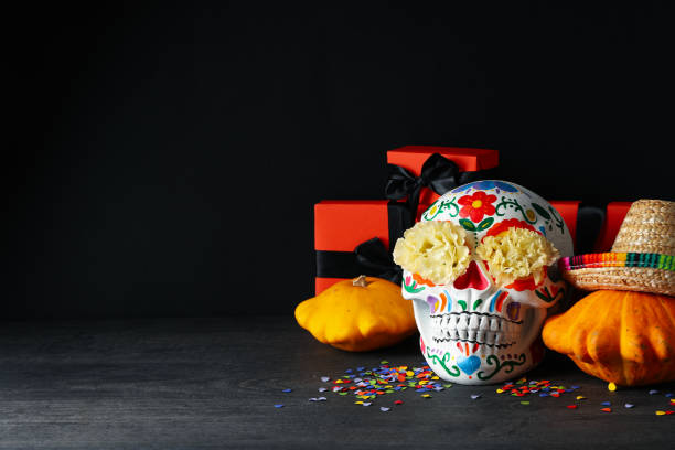 Eat less salt for health concept / Heap of white salt skull shape on dark background