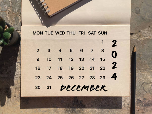 Month, time and calendar concept. Calendar for month of DECEMBER 2024. On blurred styled background. april 10 stock pictures, royalty-free photos & images