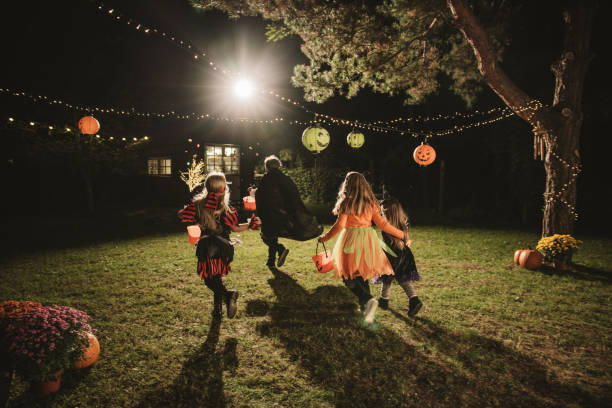 Young kids trick or treating during Halloween.