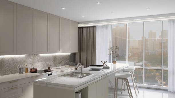 White marble kitchen island in modern, luxury kitchen with beige built in cabinet, cupboard in sunlight from window to cityscape view for interior design decoration, product background 3D
