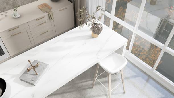 High angle view of white marble kitchen island in modern, luxury kitchen with beige built in cabinet, cupboard in sunlight from window for interior design decoration, product background 3D