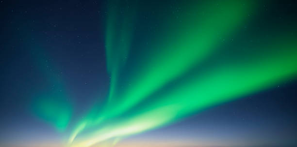 istock Blue dark sky with green polar lights and stars 2172558705