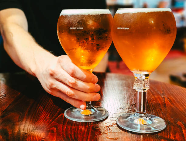 istock Pints of beer on table in the pub 2172559858