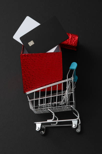 istock Black friday concept, shopping cart on dark background. 2172561628
