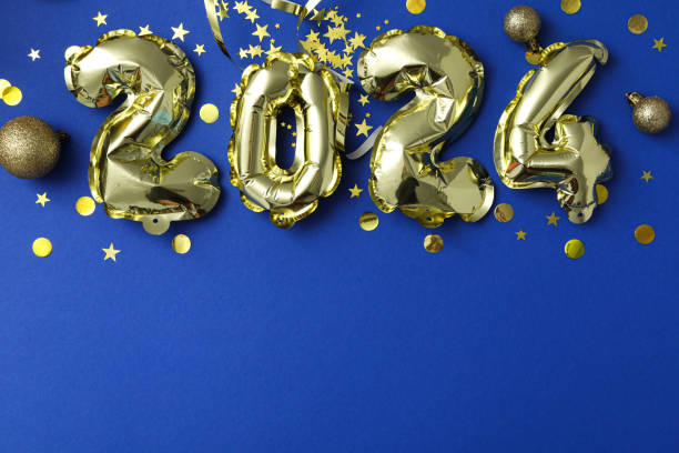 istock New Year 2024 with golden balloons on a light background 2172563620