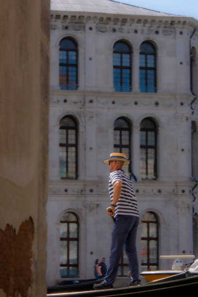 Gondolier at work in the famous city of Venice in Italy