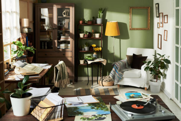 istock Relaxing Green Workspace with Open Vinyl Record Playing 2172564555