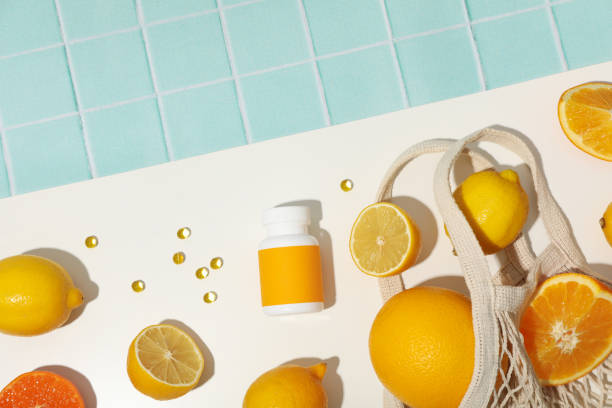 istock Bio-supplement vitamin C, in tablets on a light background. 2172565374