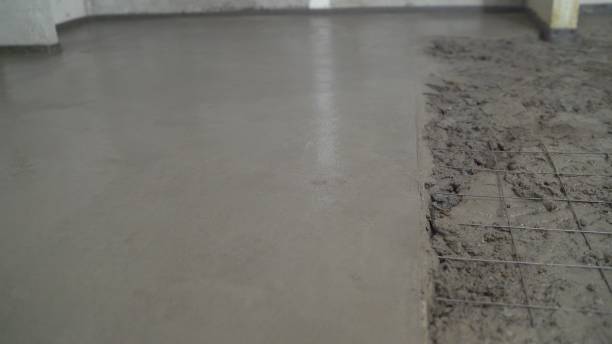 istock Made floor with building gray grout. Plaster dark black gray Construction Soft blur 2172566036