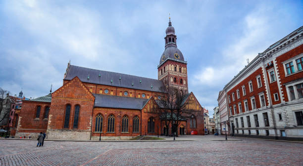 istock Exploring the stunning architecture of Riga's iconic St. Mary's Dome Cathedral under a cloudy sky 2172566634