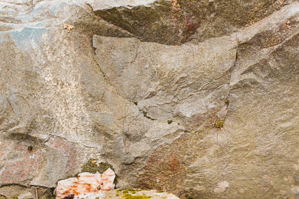 istock Raw Gray and Brown Rock Texture with Rough Hard Clifff Cracks 2172566957