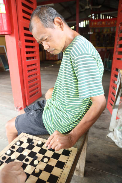 The Southeast Asian man who has cerebral palsy, is shown spending time with his mother.