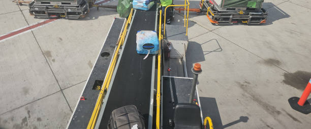 istock Baggage handling system at a busy airport terminal during 2172567693