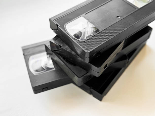 istock Stack of vintage vhs cassettes on light background 2172572167