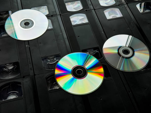 istock Retro media collection: vhs tapes and compact discs on display 2172572179