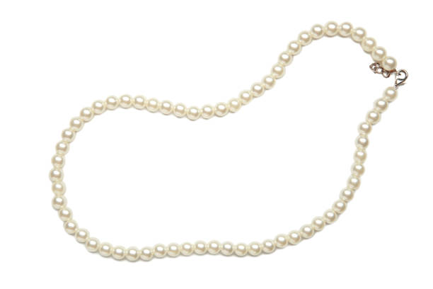 istock Elegant pearl necklace isolated on white background, top view. Space for text 2172572307