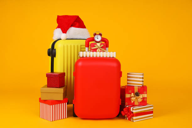 istock Suitcases with a New Year's hat and gifts 2172572458