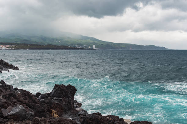 Ponta Delgada, Azores Islands, Portugal - April 26, 2017: A serene coastal view showcasing natureâs contrast.