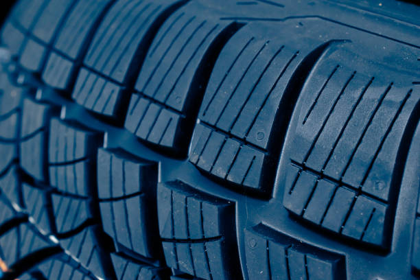 istock blue tire tread, tire traces background 2172580073