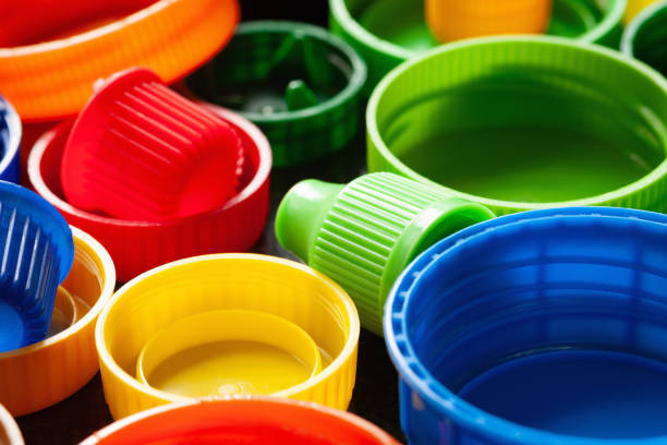istock Plastic caps. Multi-colored plastic caps. Recycling of plastic. 2172582239