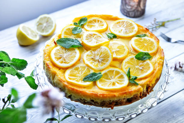 istock Light, refreshing lemon tart or lemon cake garnished with mint and lemon slices 2172587205