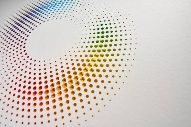 istock Minimalist circular paper design with rainbow color gradient shining through perforated white background 2172589832