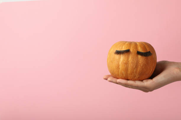 istock Pumpkin with eyelashes. Skin and face care concept. 2172590017