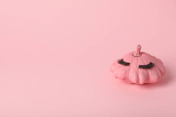 istock Pumpkin with eyelashes. Skin and face care concept. 2172590052