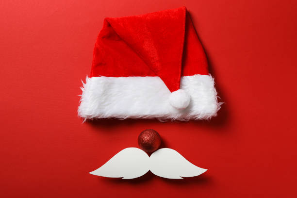 Red cap of Santa Claus with a white mustache