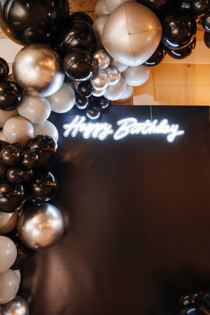 istock Festive birthday decor with silver and black balloons 2172602672