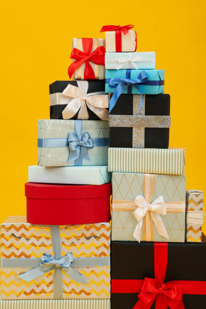 istock A Christmas tree is laid out with gifts. 2172603435