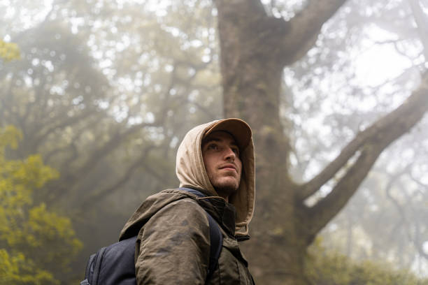istock Hiker taking a route through the forest on an autumn day 2172607841