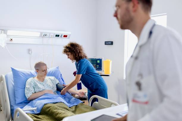 istock Nurse visiting a patient in the hospital 2172608306