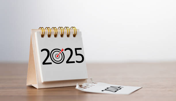 istock 2025 Happy New year background. Turns over a calendar sheet. Setup objective target business cost and budget planning of new year concept. year change from 2024 to 2025. 2172610403