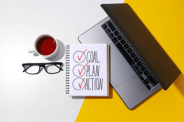 istock Goal plan in notebook with laptop and tea 2172610553