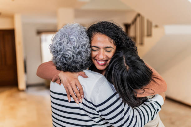 istock Family embraced at home 2172615396