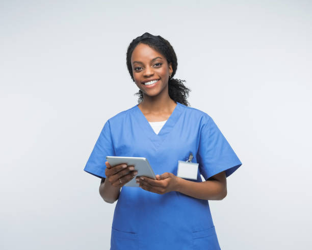 istock Portrait of friendly nurse using digital tablet 2172618098