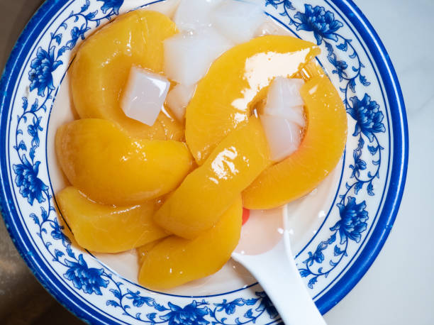 istock Sweet and delicious: Sugar-preserved peach and coconut dessert 2172618826