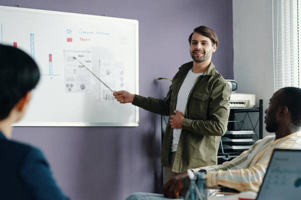 istock Businessman Presenting His Report At Meeting 2172620296