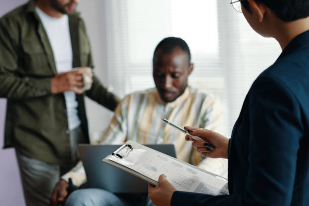 istock Businesswoman With Report Working With Colleagues 2172620848
