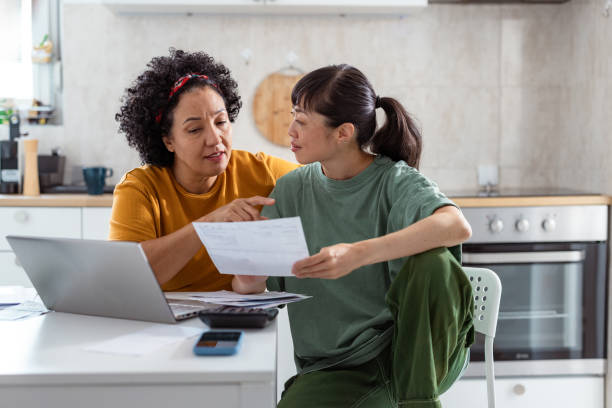 istock Two lesbians managing household budget together 2172621280