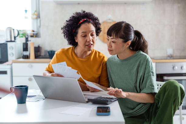 istock A gay couple organizing finances 2172621301