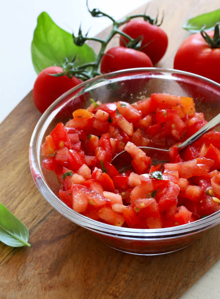 istock Tomatoes, olive oil and basil for bruschetta. 2172626155