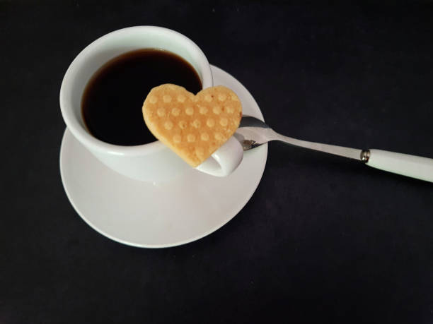 istock Cup of coffee with heart shaped cookie 2172632109
