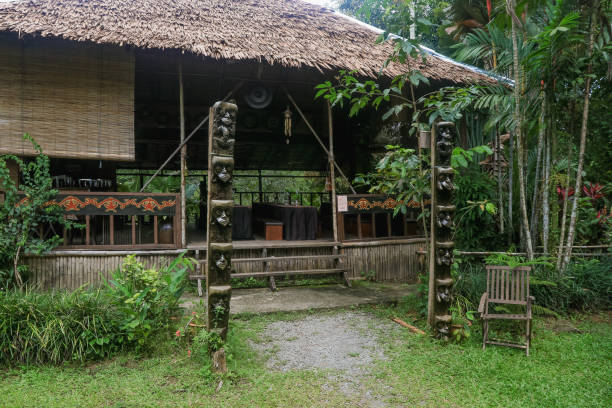 istock Traditional bamboo structure surrounded by lush greenery in Kota Kinabalu, showcasing local architectural style in a tranquil setting 2172634248