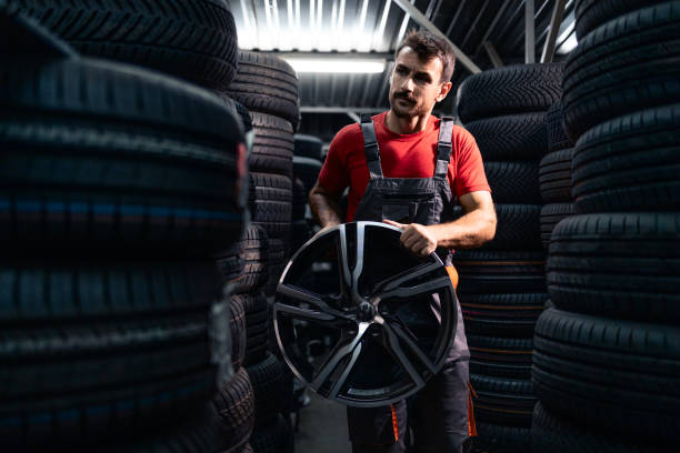 istock Car tires and wheels storage room. 2172634569